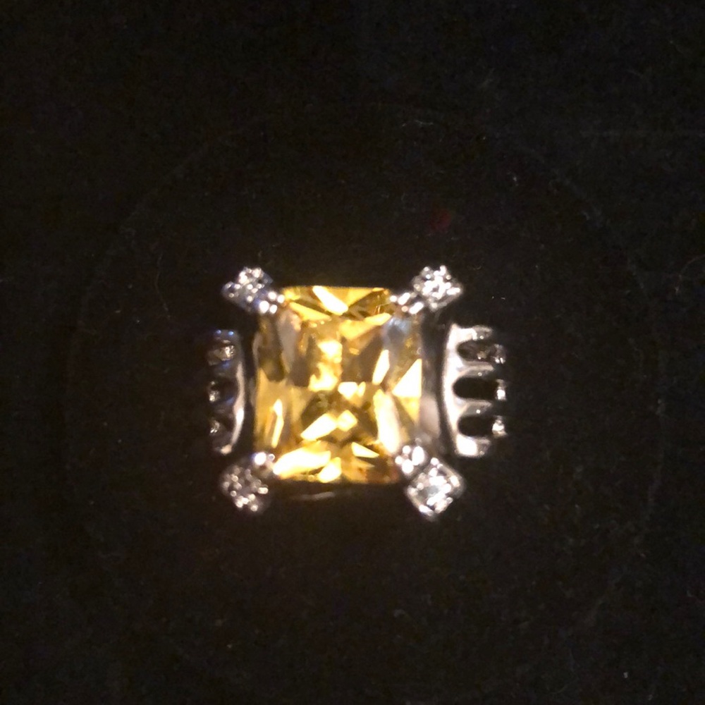 Sterling silver ring with large yellow stone